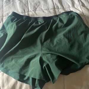 Athleta size small running shorts, green, excellent condition